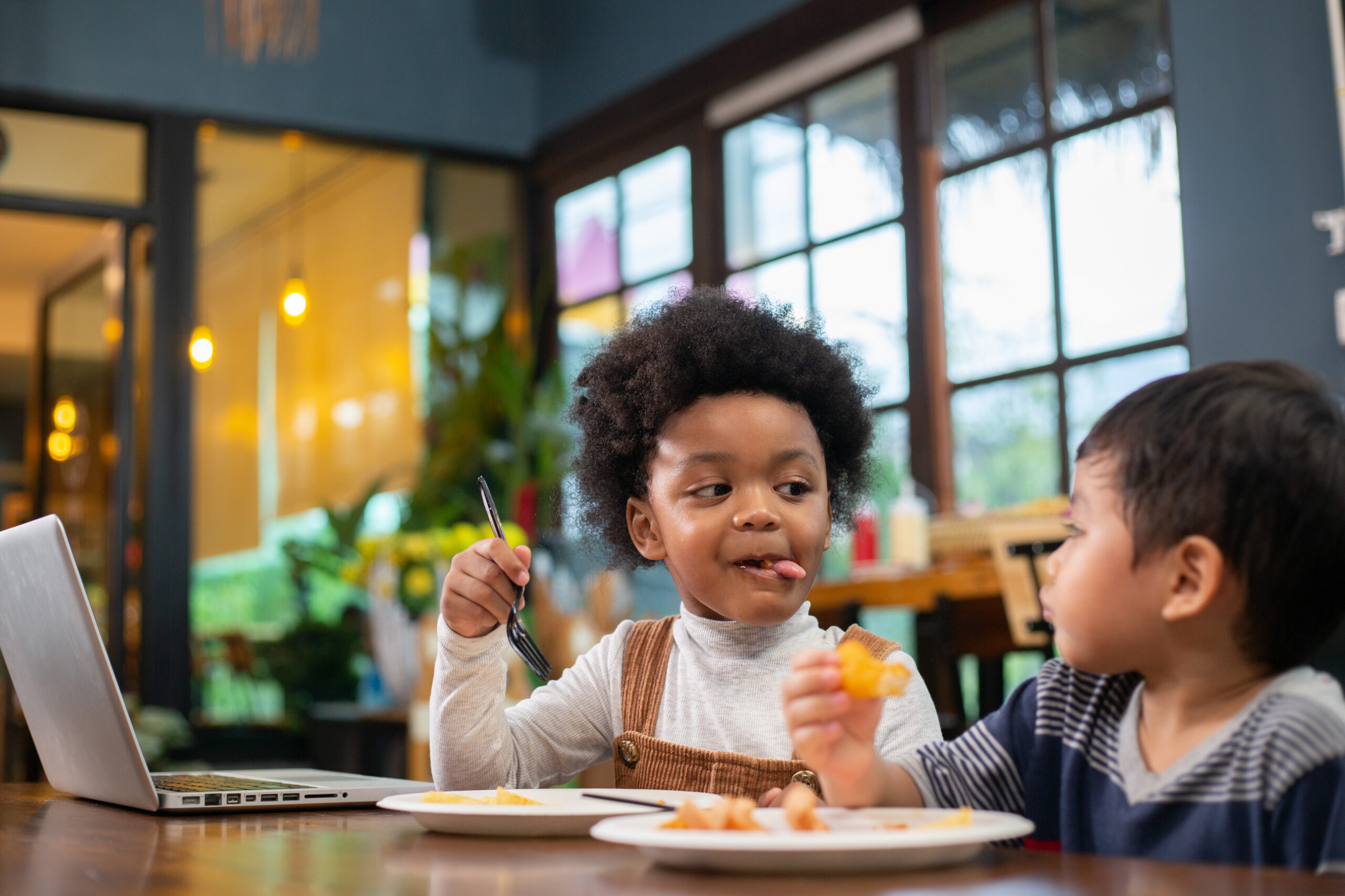 Kids eating in a restaurant